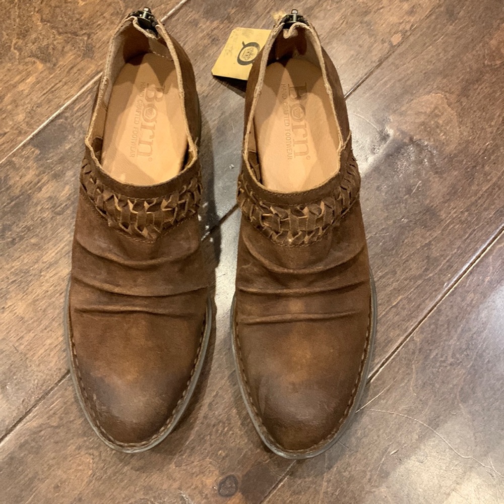 Never worn.  Born boots.